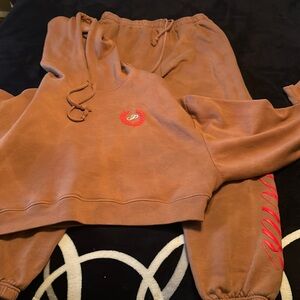 Set of sweats bottoms is L and top XL , used twice good condition
